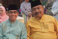 Bupati H.Mursini bersama Datuk Bisai Edyanus Herman Halim (Foto Istimewa)