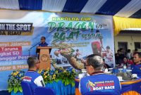 Ketua PODSI Riau Drs H.Mursini, MSi memberikan sambutan pada acara pembukaan "Marine Dragon Boat 2019" (Foto : Humas Kuansing)