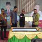 Bupati H.Mursini dan Pimpinan Bank Riau Kepri Deny Mulya Akbar tandatangani Mou Kamis (19/12/2019) siang tadi (Foto KuansingKita)