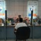 Nasabah dsn karyawan BRI Telukkuantan diwajibkan memakai masker (Foto dok BRI)