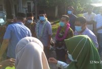 Penyambutan .Mursini - Indra Putra serta Tim Bermitra di Desa Pulau Mungkur (foto dok Bermitra)