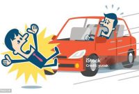 Businessman about to be hit by a car.